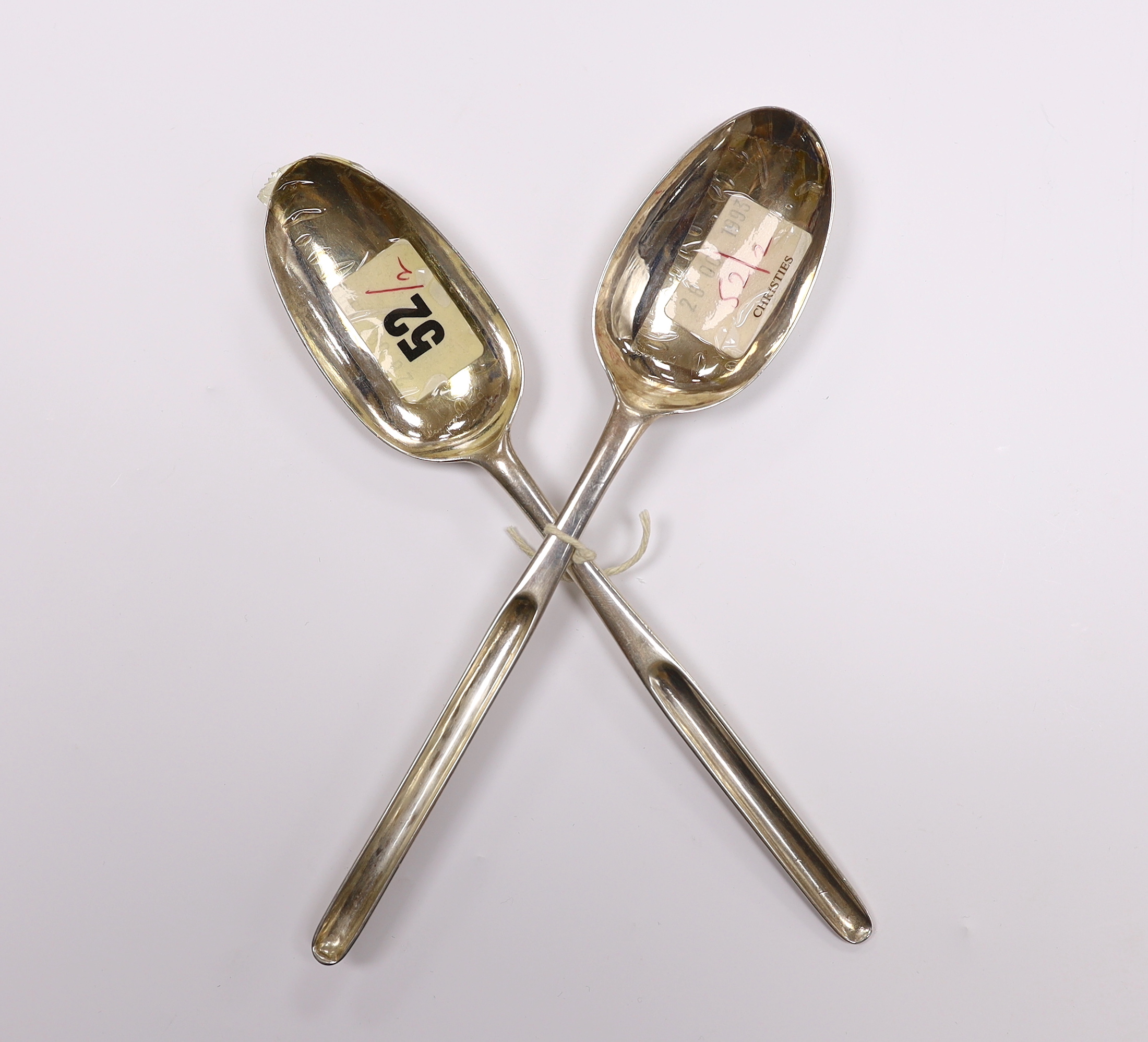 Two 18th century silver combinations marrow scoop spoons, William Matthew I, London, 1703, with rat tail back and later with rubbed marks.